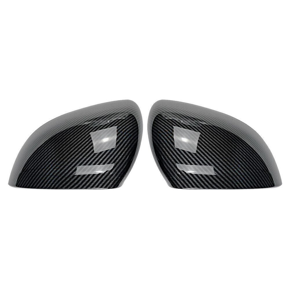 A pair of carbon fiber rearview mirror cap trims for the for Mercedes-Benz C-Class W206 BLK