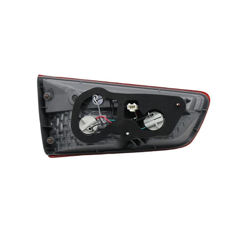 The right inner taillight assembly and rear brake light are compatible with the for Kia K2 Hatchback (2012-2014).