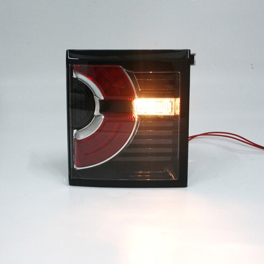 The right rear brake light is integrated into the taillight for Land Rover Discovery Sport models from 2015 to 2019.