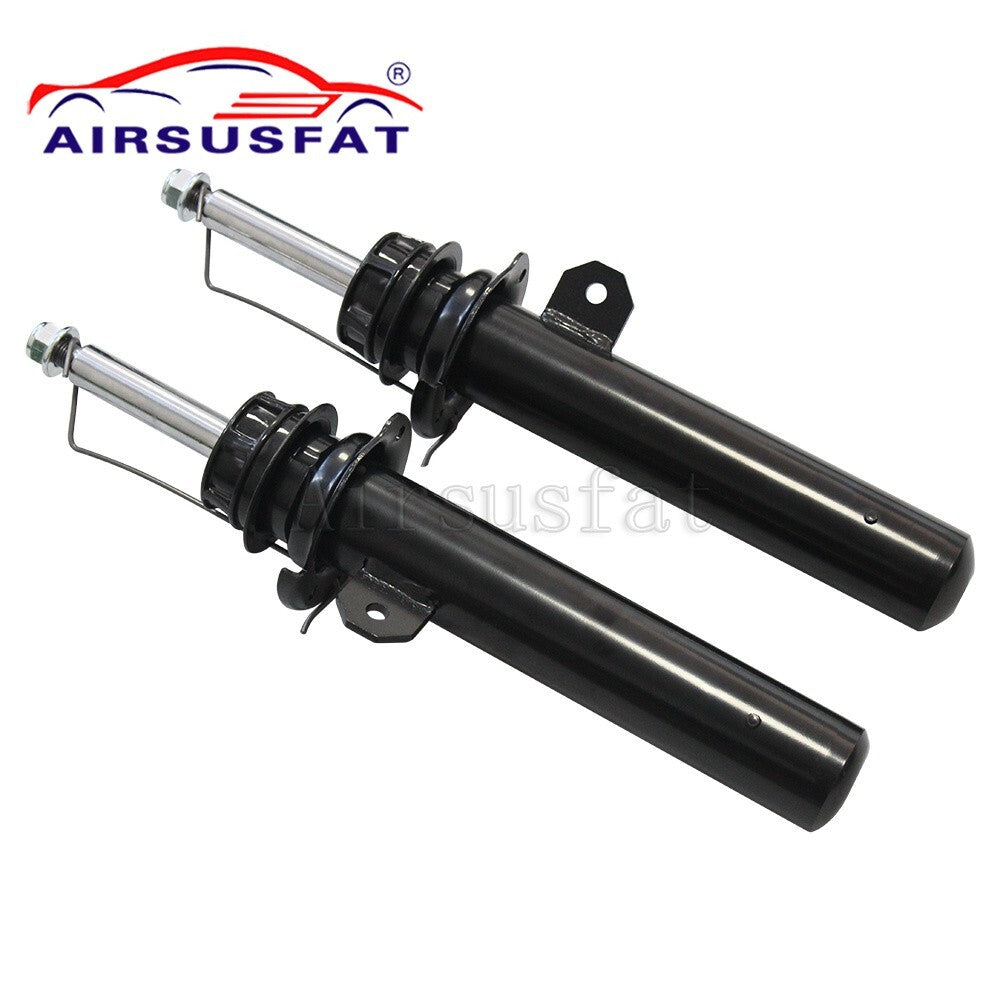 A pair of front left shock absorber struts with EDC for Mini Cooper 2014-2022.