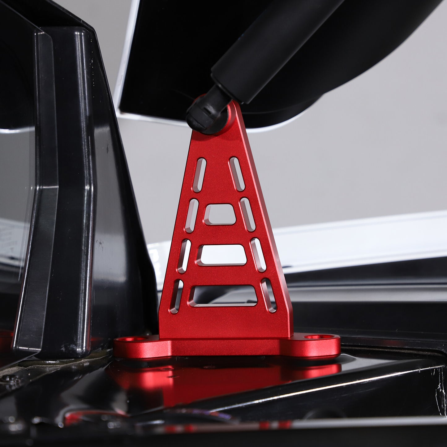 Red alloy E-Ray RaceLite rear cabin support bracket for Corvette C8 2020-2024