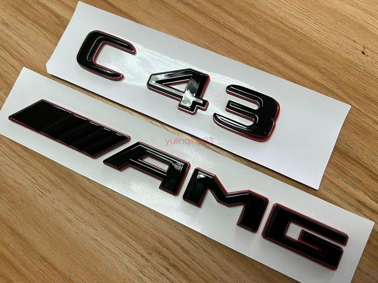 Black and red numeral and letter trunk badge applicable to C43 AMG