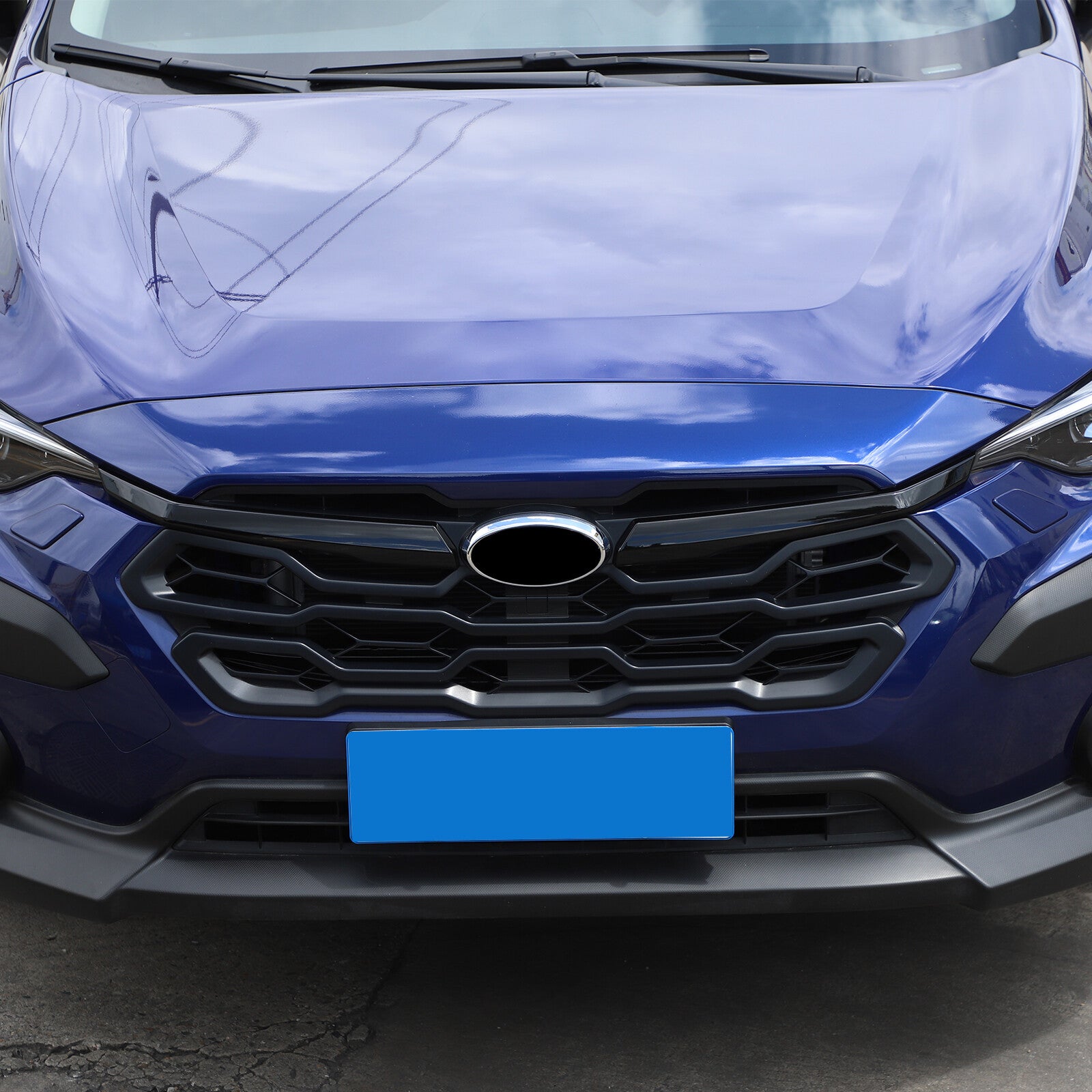 Black front grille with central grille stripe trim available on for Subaru Crosstrek 2023 and 2024 models.