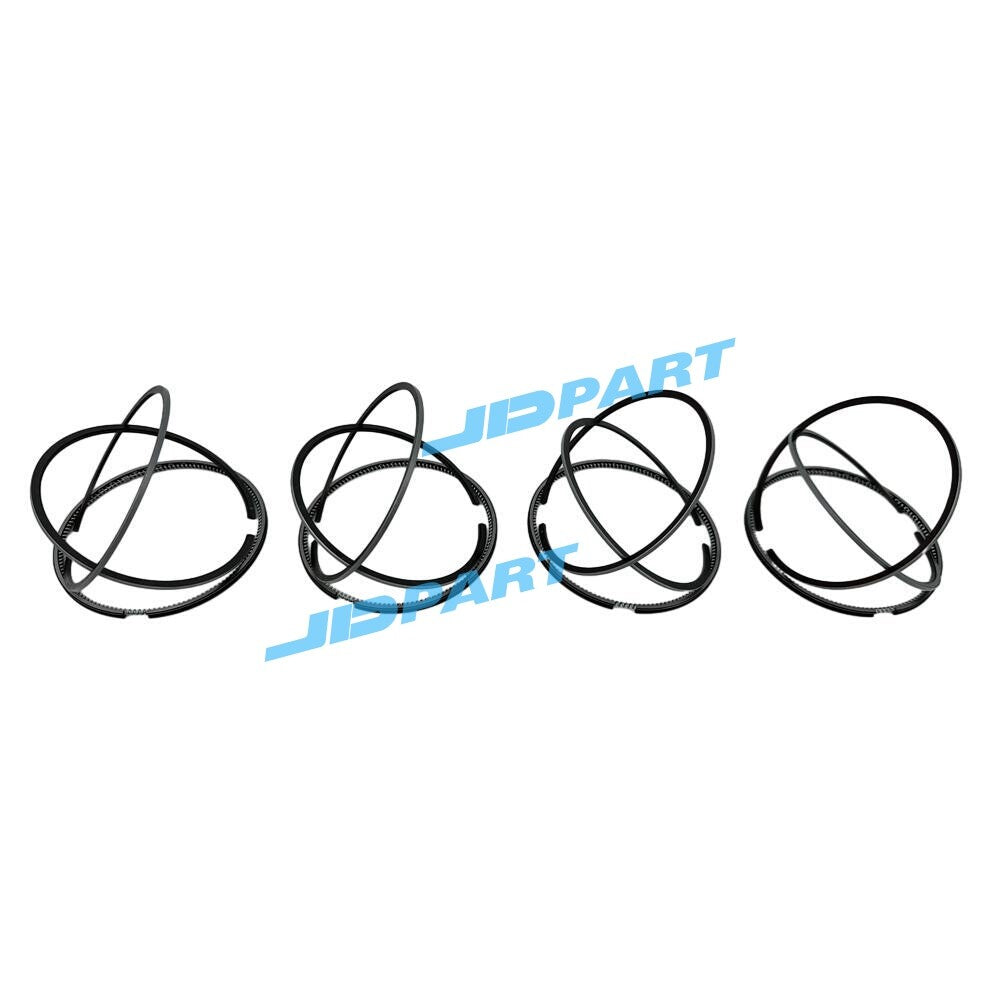 4-piece 4M40 piston ring kit, STD 95mm, for excavator engine parts.