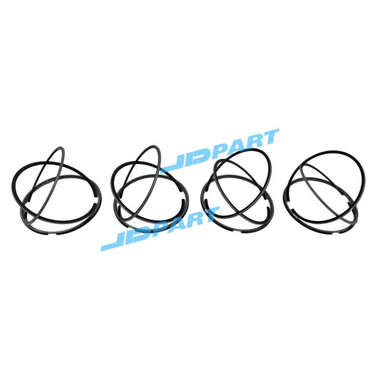 4-piece 4M40 piston ring kit, STD 95mm, for excavator engine parts.