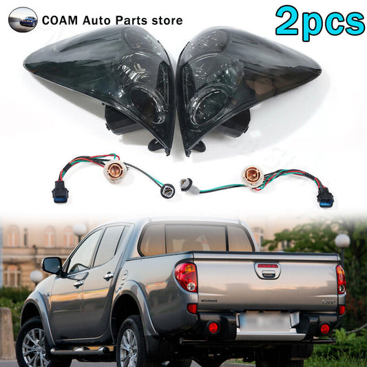 A pair of Triton Colt pickups for Mitsubishi L200 2005-2016 taillights and rear brake lights.