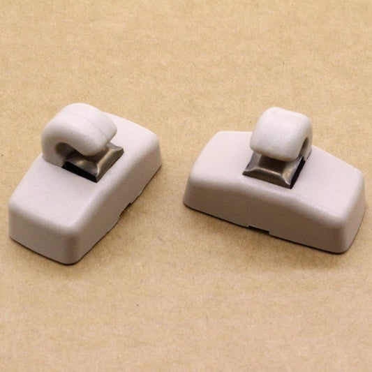 Two beige sun visor clip kits for Volkswagen for Jetta , for Golf , for Passat , Beetle, and for Skoda .