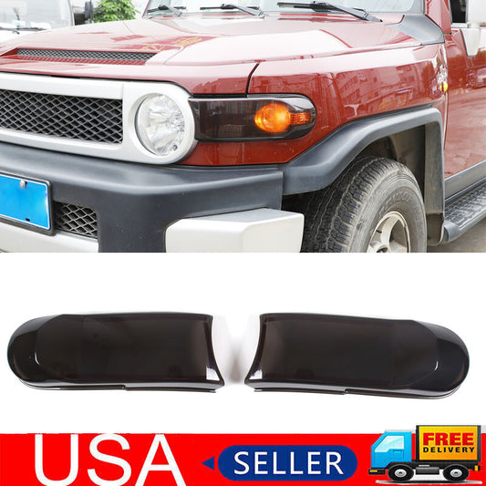 Smoked black front turn signal light cover trim for 2007-2014 for Toyota FJ Cruiser.
