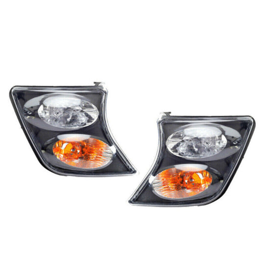 A pair of black turn signals for the corner lights, suitable for 1998-2003 for Nissan Patrol Y61 models. Q