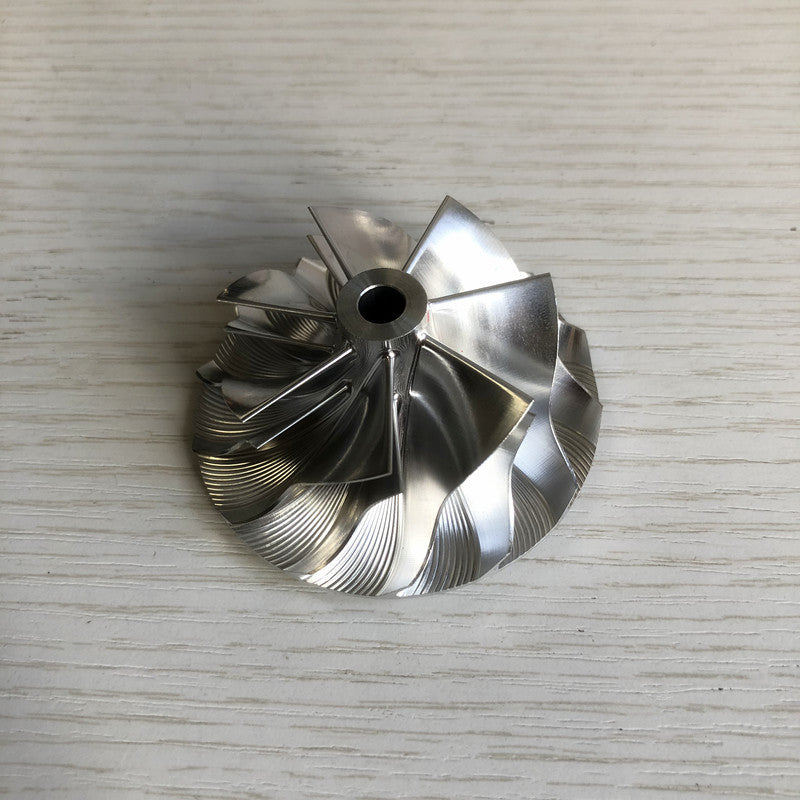 TD05H Reverse 7+7 Insert 49.33/65.00 mm Turbine Milling/Burnt Compressor Wheel