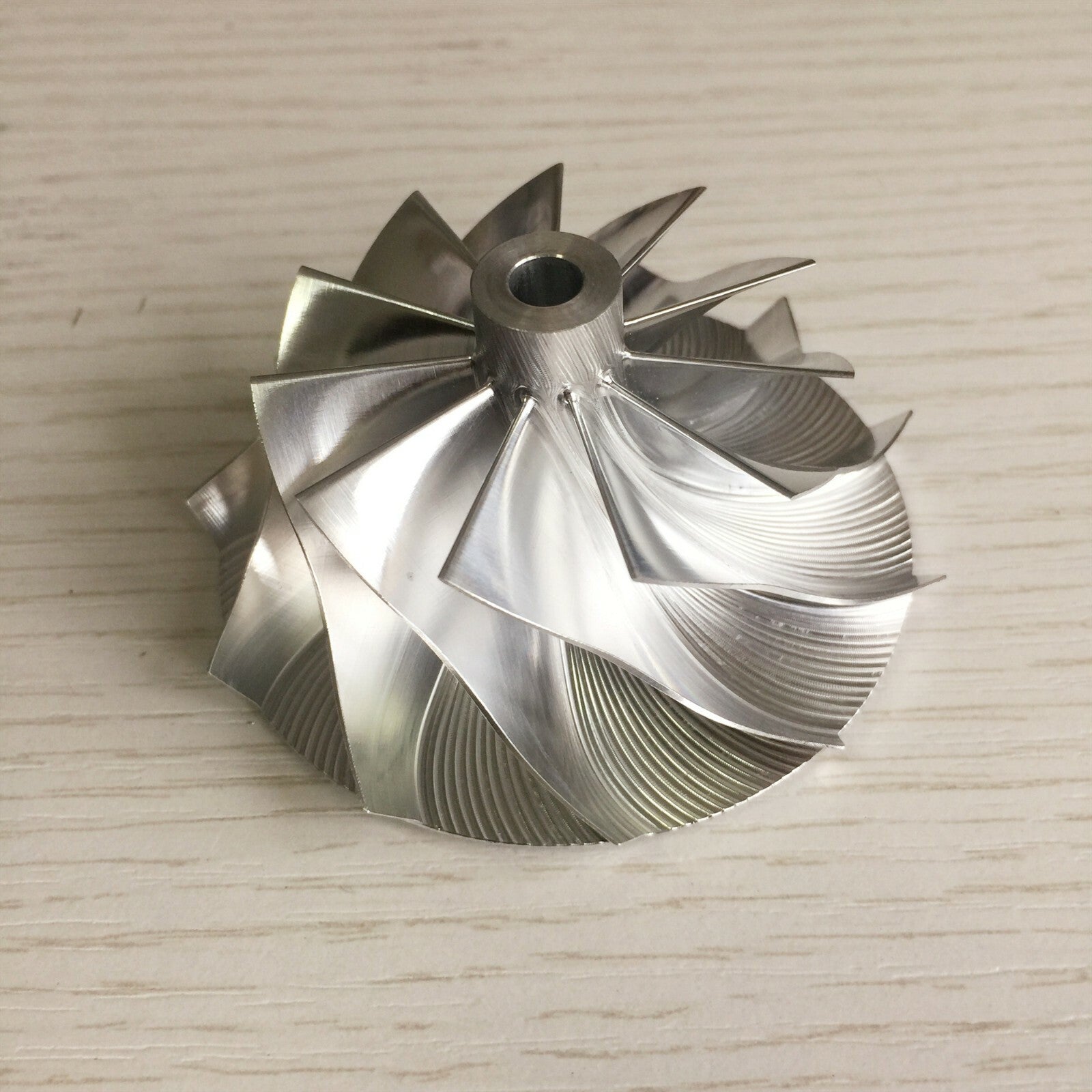 CT26 48.30/64.89 mm 11+0 Blade Turbine Milling/Blank Compressor Wheel