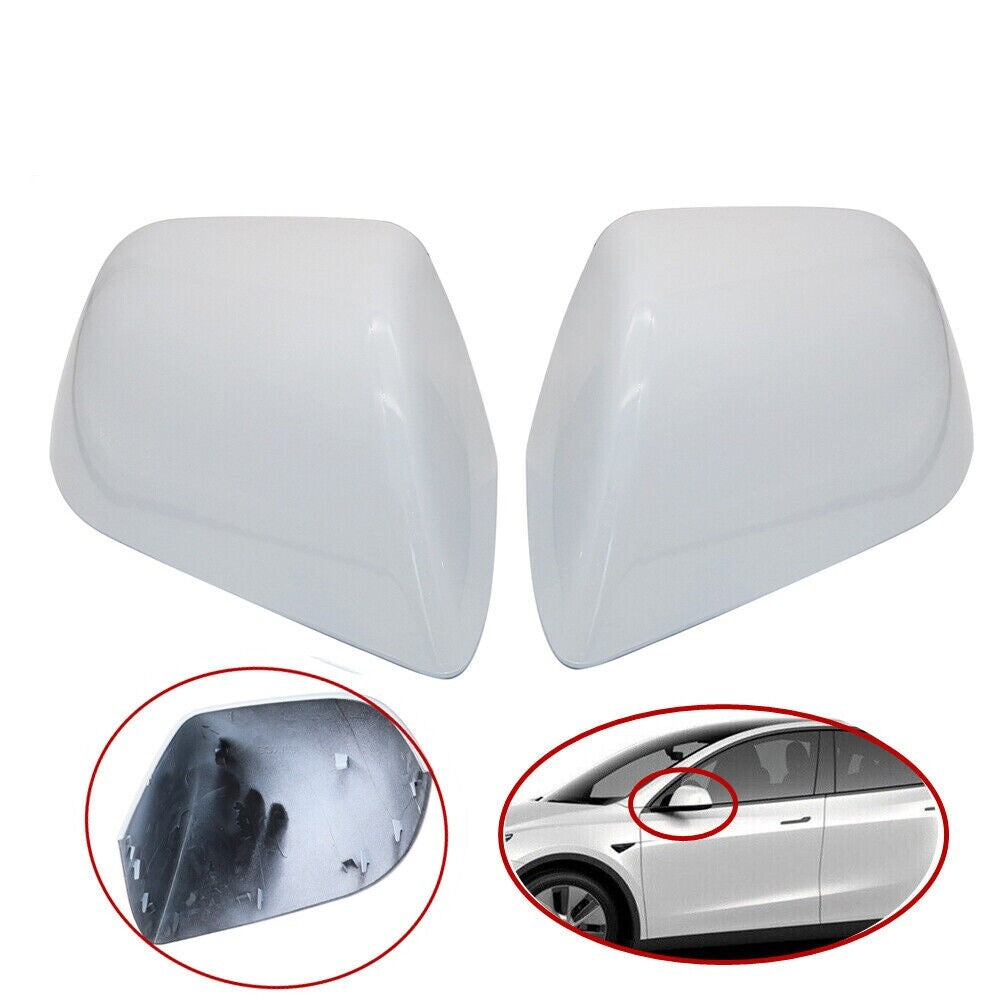 A pair of pearl white rearview mirror caps/skull caps for Model 3. n