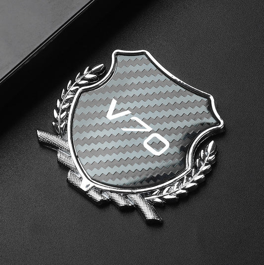 Carbon-plated side fender and window badge stickers for Volvo C70 cars.