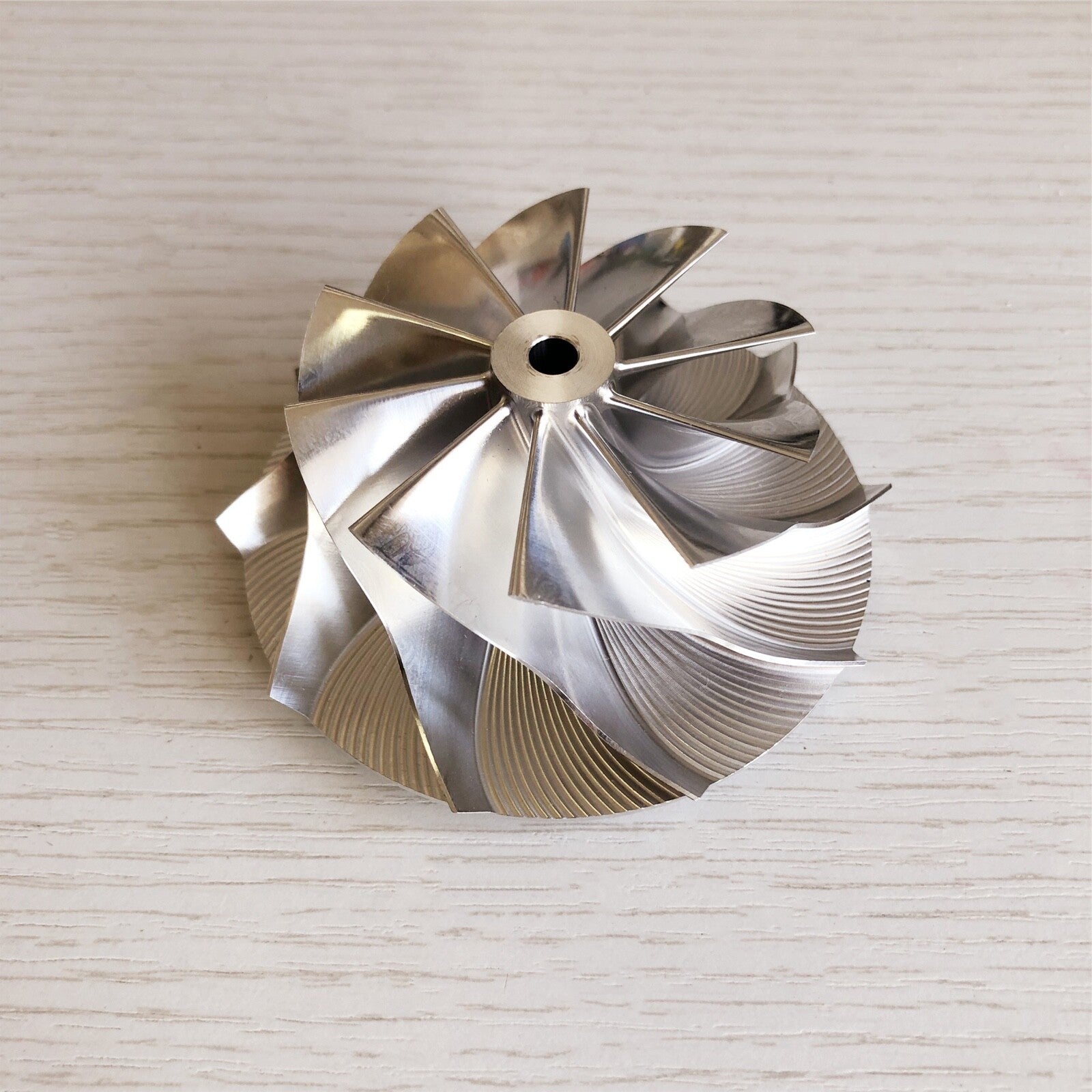 GT15-25 forward 56.50/77.00 mm 10+0 blade performance billet compressor wheel