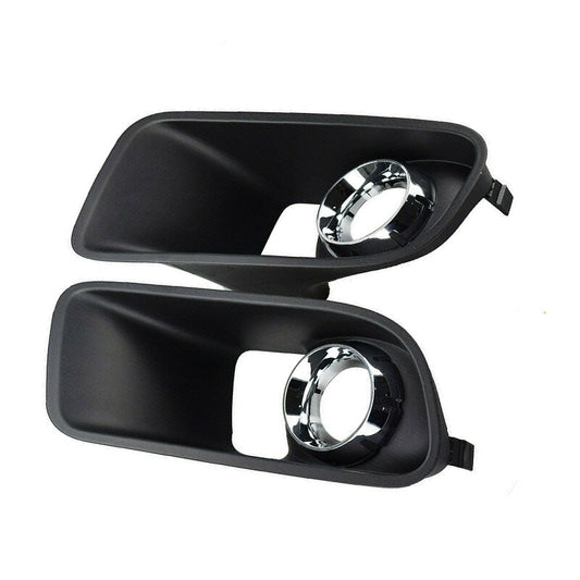 A pair of front bumper fog light covers for Dodge chargers from around 2012-2014. n