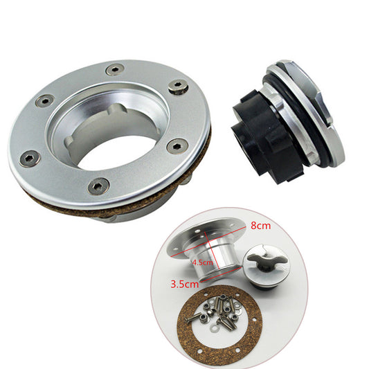 Silver aluminum alloy aircraft-style fuel cell tank cap with embedded mounting and 6-hole anodized finish. n