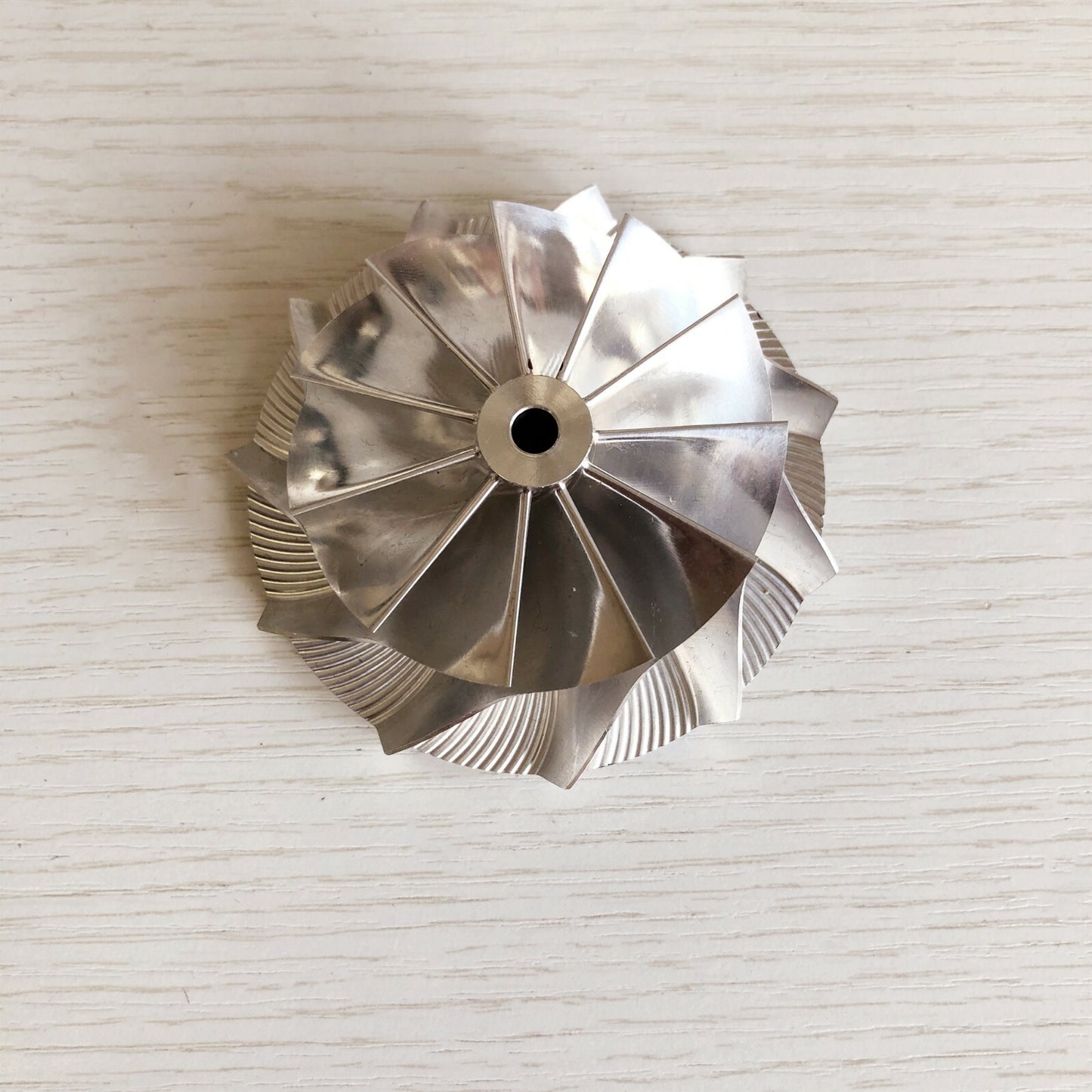 K16 Reverse 59.00/78.00 mm 11+0 Blade Turbine Milling Compressor Wheel