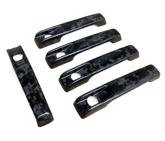 forged carbon fiber door handle cover kit for Mercedes-Benz W463, G-Class, G55, and G63.