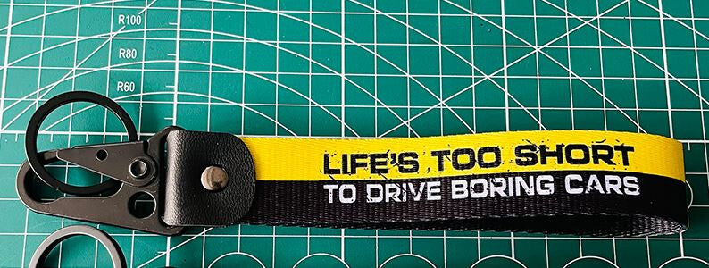 Car keychain/key ring with lanyard, car accessories, black and yellow, suitable for Mitsubishi .
