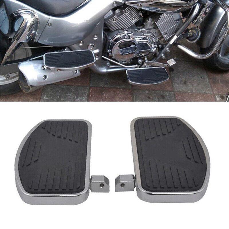 A pair of motorcycle ambidextrous floor foot pedals for relaxation. n