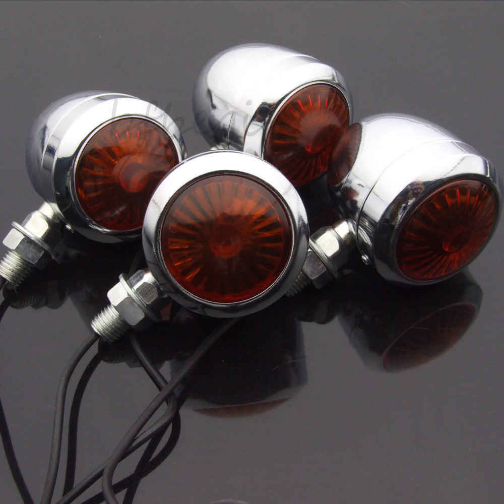 2 pieces of chrome motorcycle amber flashing lights, brakes, running lights, turn signals, and round taillights