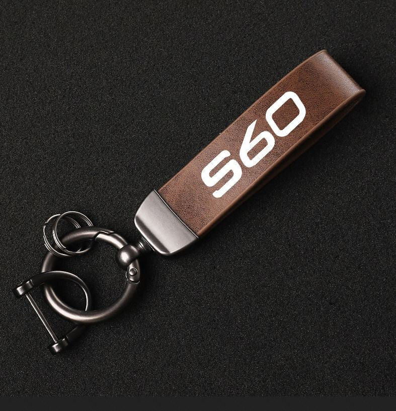 Black leather horseshoe buckle accessory for Audi Q1 car keychain/key ring.
