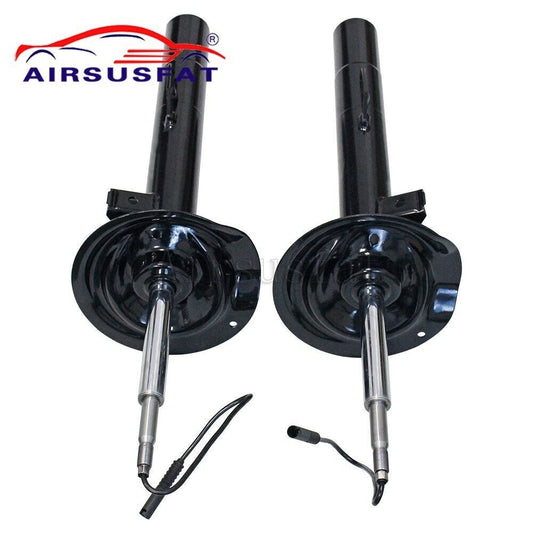 A pair of front suspension struts with EDC for BMW E38 740i, 740iL, and 750iL. new, 1995-2001.