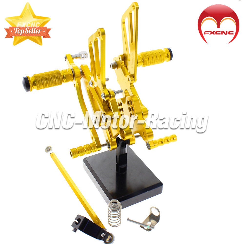 Adjustable rear wheel assembly with spikes and footrests suitable for CBR600F F4I 2001-2007 CNC machines.