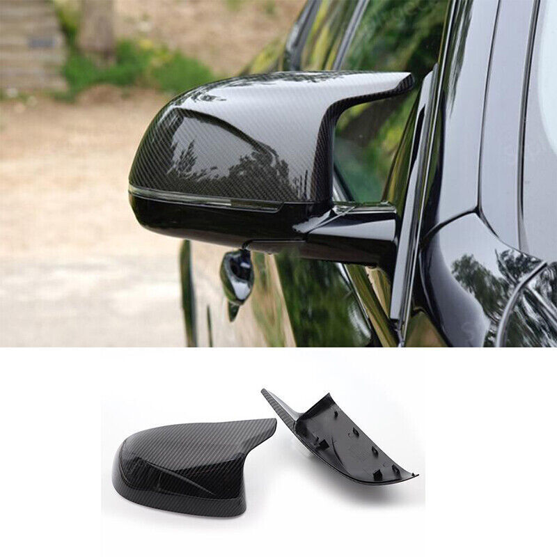 Carbon fiber bullhorn-shaped rearview mirror cover trim for BMW X5, F15, and X6 (2014-18). Q