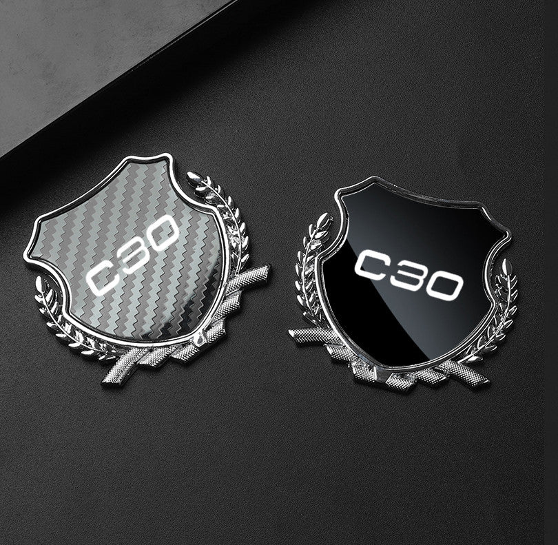 Black side fender and window badge decals for Volvo S40 cars.