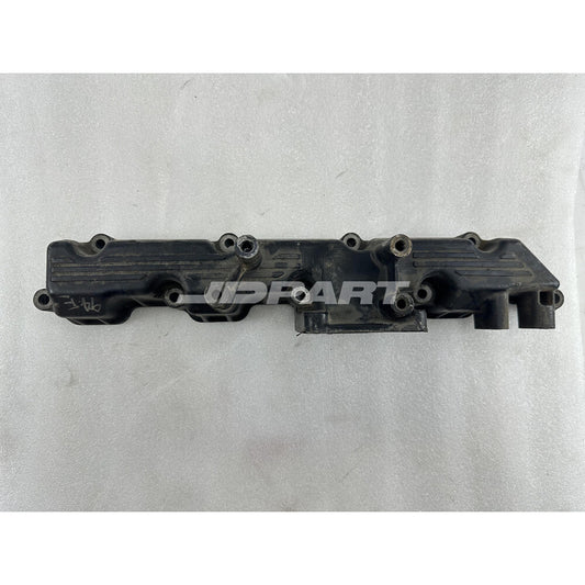 4TNE94 intake manifold is suitable for excavator engine parts.