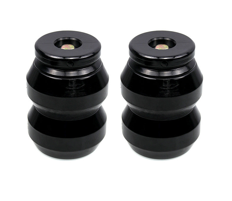 Rear suspension reinforcement system for Ram 1500 2009-2021 with rubber anti-collision stops.