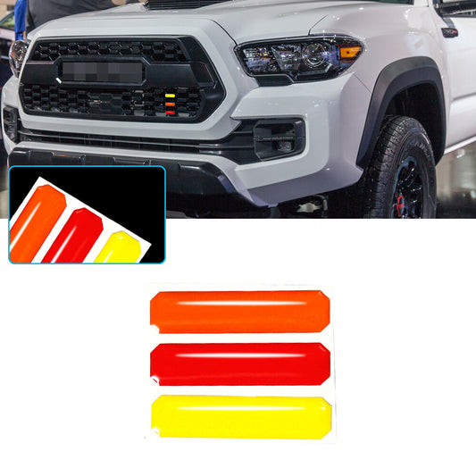 Grill decals in 3 colors: red, orange, and yellow. 3D dome design suitable for Toyota Tacoma 4Runner Tundra.