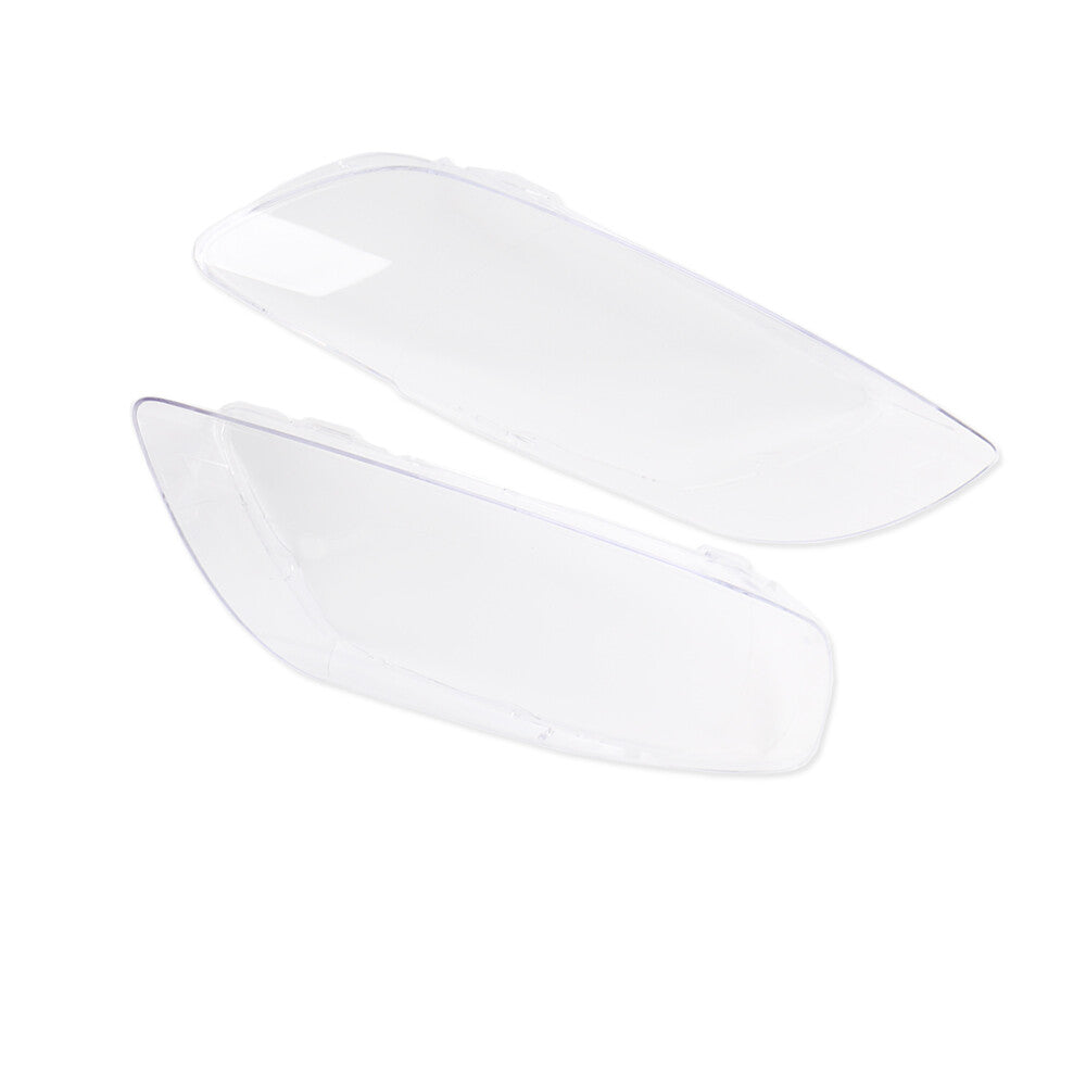 Left and right front headlight protective covers and lens housings for Audi Q7 models from 2006 to 2015.