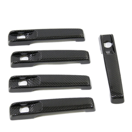 carbon fiber door handle cover trim for Mercedes-Benz W463, G-Class, G55, G63, and AMG.