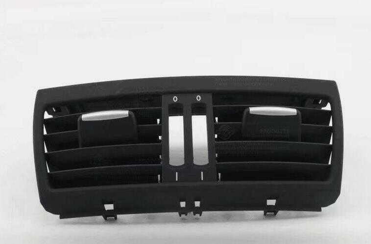 The rear black center console air vent grille cover is suitable for E70, X5, E71, and X6. n