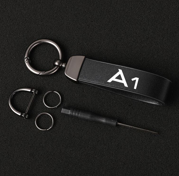 Side fender badge sticker for Cadillac ATS/CTS, matte black, 6.2 cm x 2.4 cm.