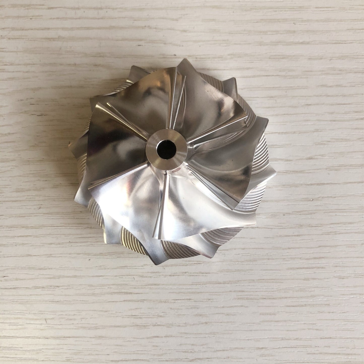 T04S 409535-0001 59.05/76.07 mm 6+6 Blade Turbine Milling/Blank Compressor Wheel