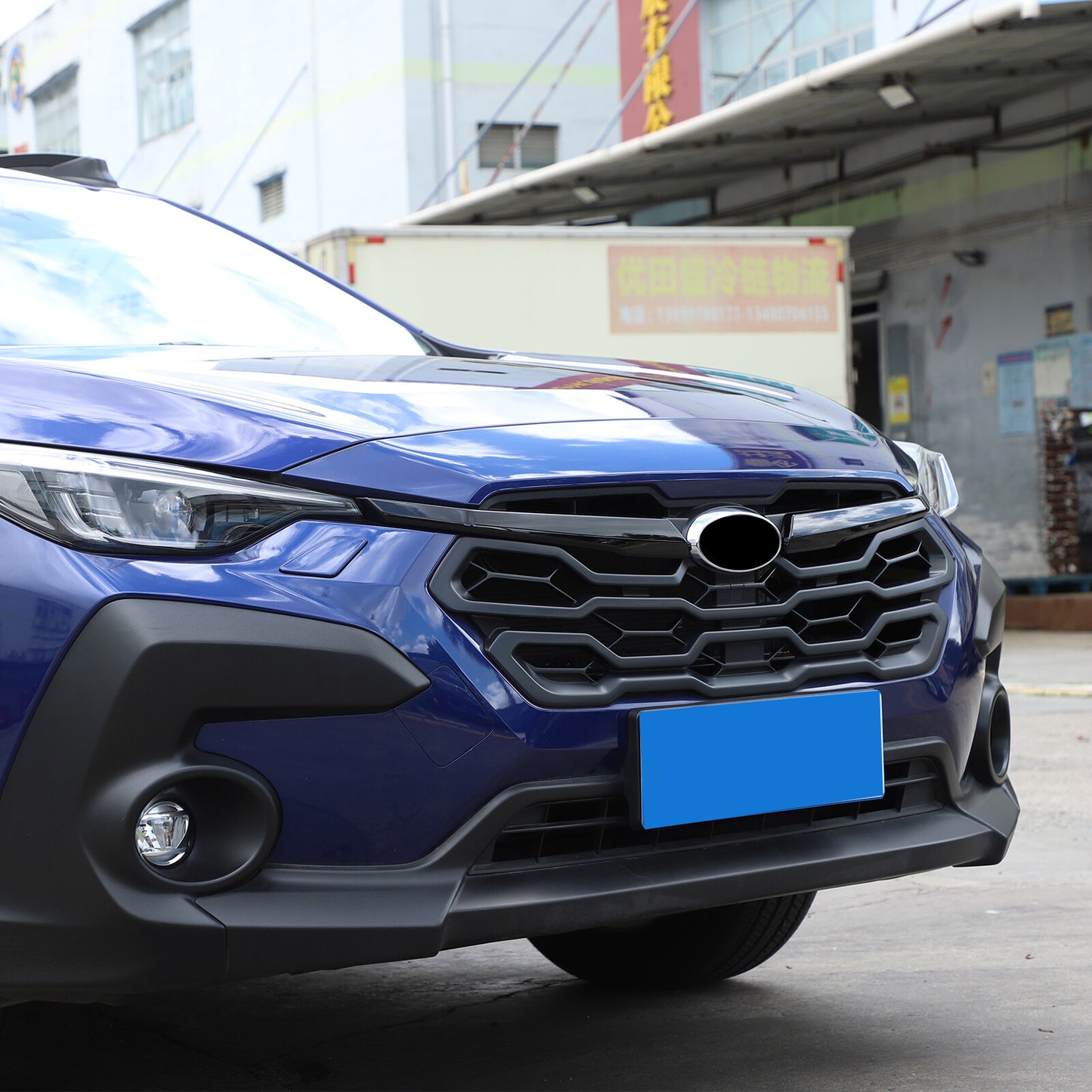 Black front grille with central grille stripe trim available on for Subaru Crosstrek 2023 and 2024 models.