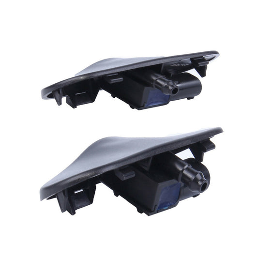 A pair of heated windshield washer spray nozzles for Audi Q3 Q