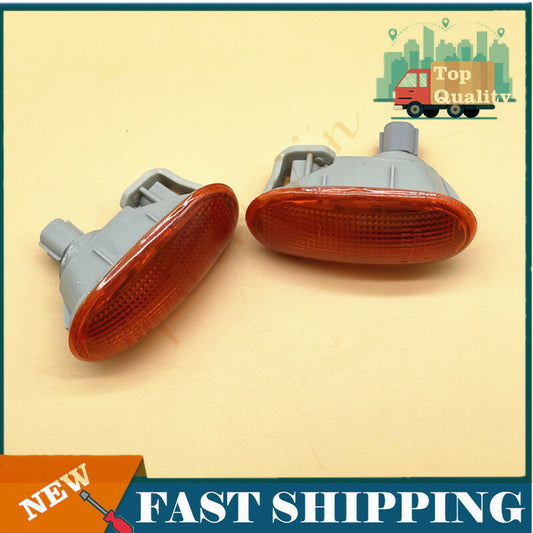 A pair of amber parking lights and bulbs suitable for Mirage 1992-2000- n