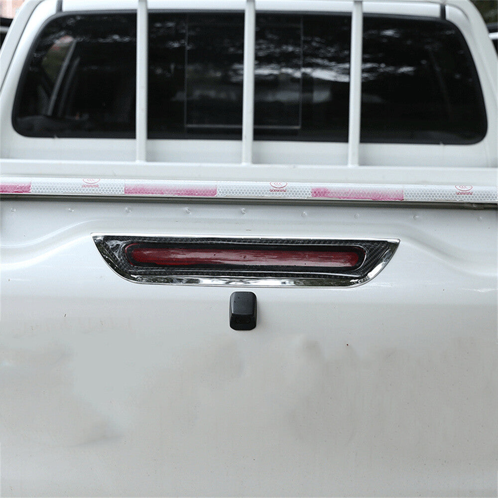 For T@yota Hilux Revo 2015-2021 Carbon Fiber Rear Tailgate Brake Light Lamp Trim