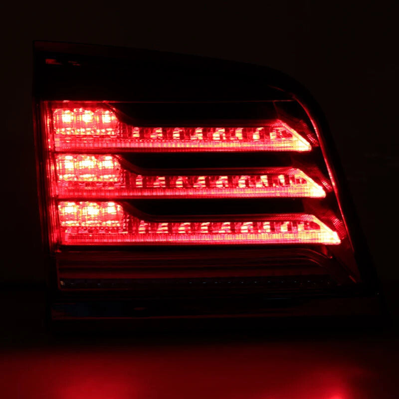 A pair of taillight turn signals for Lexus LX570 2012, 2013, 2014, and 2015 LHRH models.