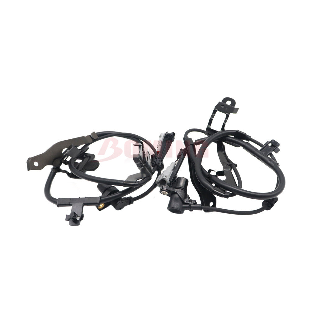 Two ABS wheel speed sensors, 89542-0C010 and 89543-0C010, for Toyota Sequoia Tundra.