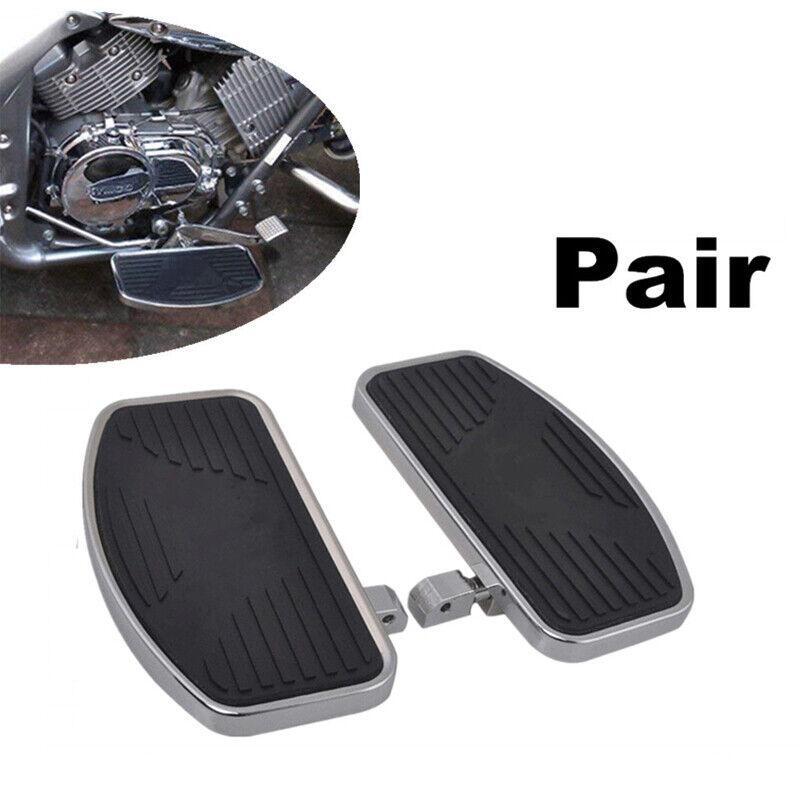 A pair of motorcycle ambidextrous floor foot pedals for relaxation. n