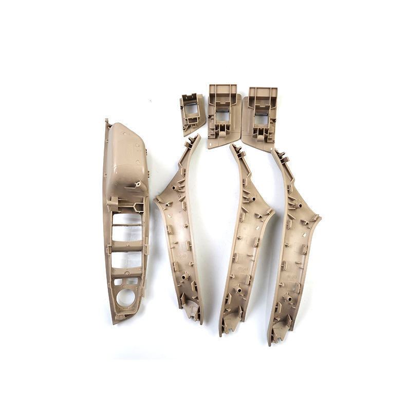 One set of beige and white interior door handle panels suitable for BMW F10, F11, 520i, 525d, 535i, and 550i.